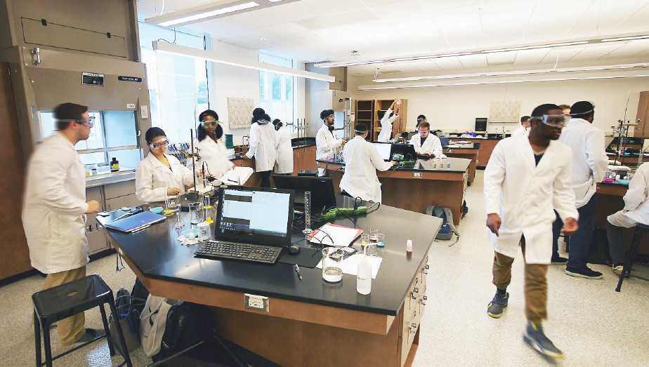 Students in a chemistry lab at the Edward St. John Teaching & Learning Center