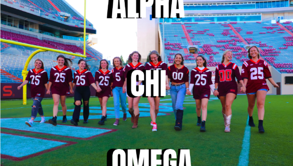 Image reads Alpha Chi Omega overlayed on a picture of members smiling and walking on worsham field