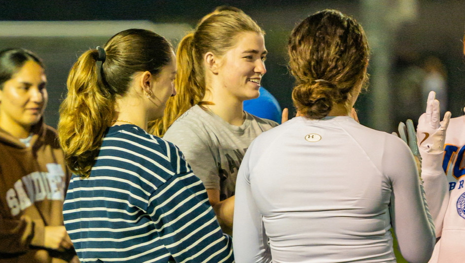 Flag football athlete smiling and talking