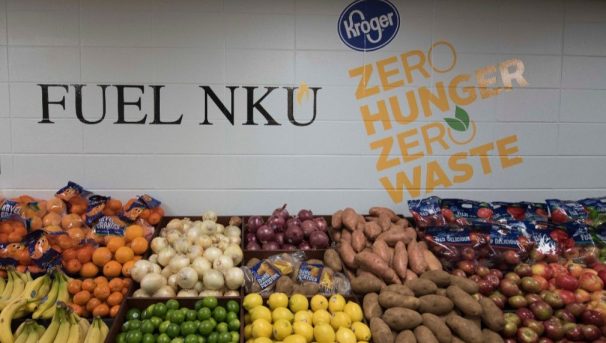 FUEL NKU wall with FUEL NKU Logo and produce display bins full of fresh produce