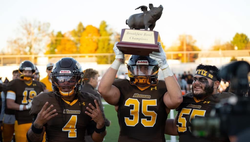 Football players celebrating the win