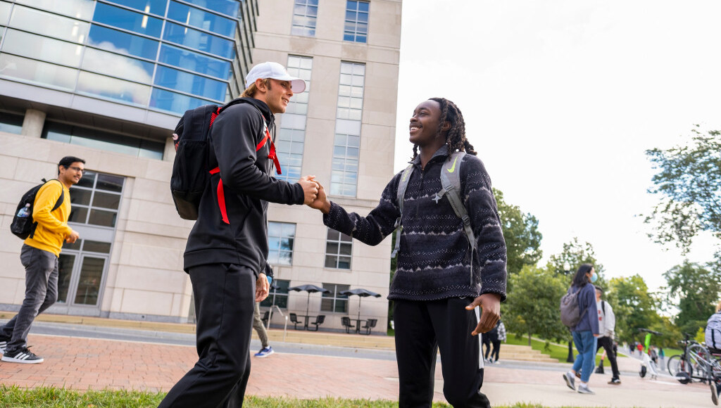 Students in front of Thompson Library