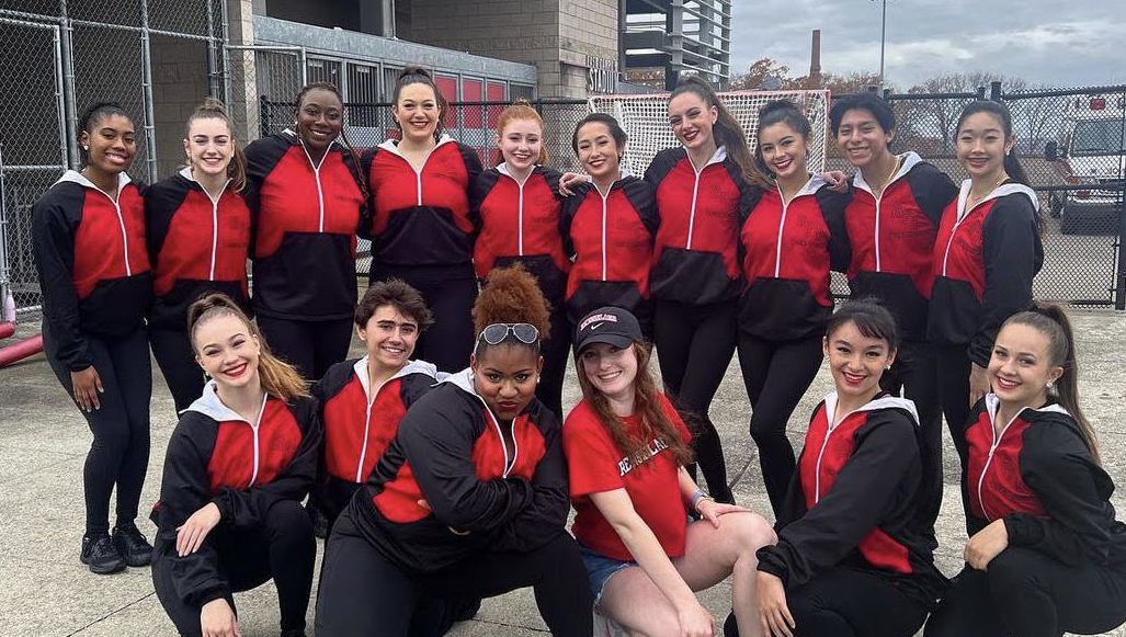 Members of the dance team in their warm-up gear