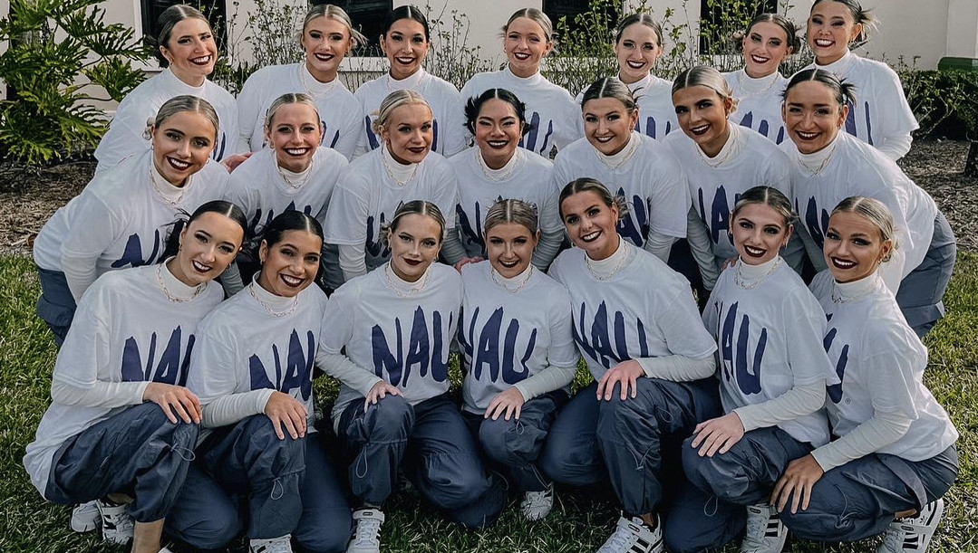 Dance team posing outside