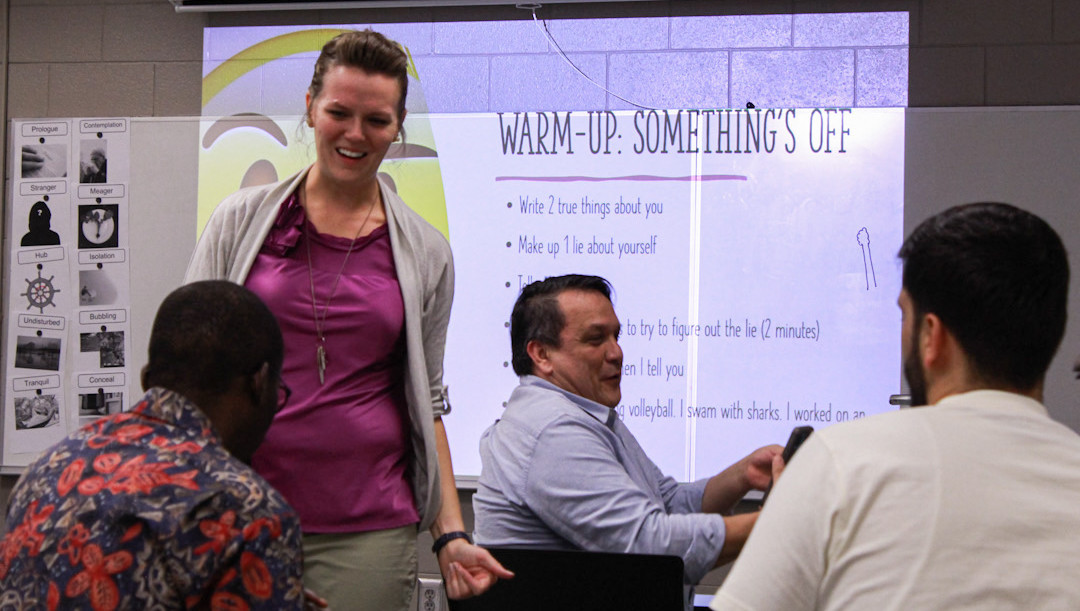 A CBAEP professor interacts with her students.