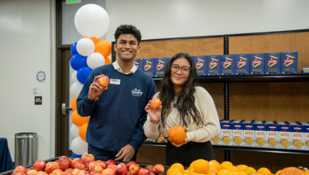 student "shopping" at ASI Food Pantry