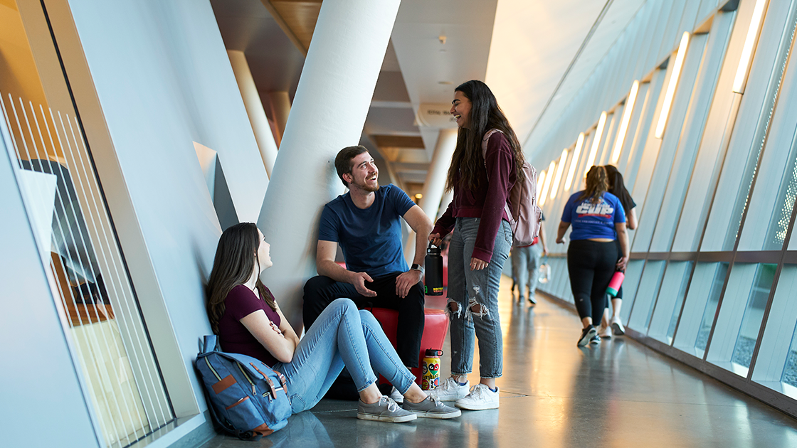 Students talking in SRC hallway.