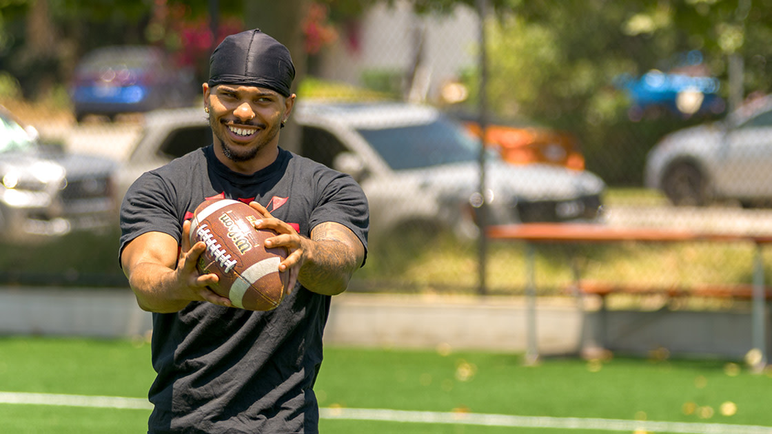 Student catching a football