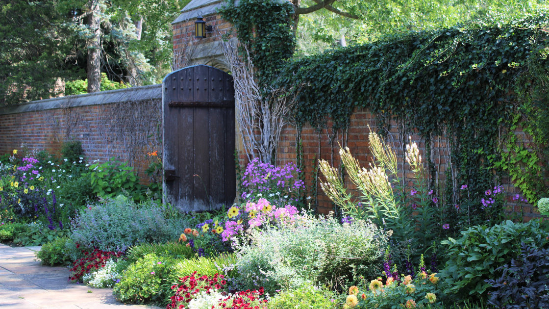 Meadow Brook Hall gardens with colorful, blooming flowers.