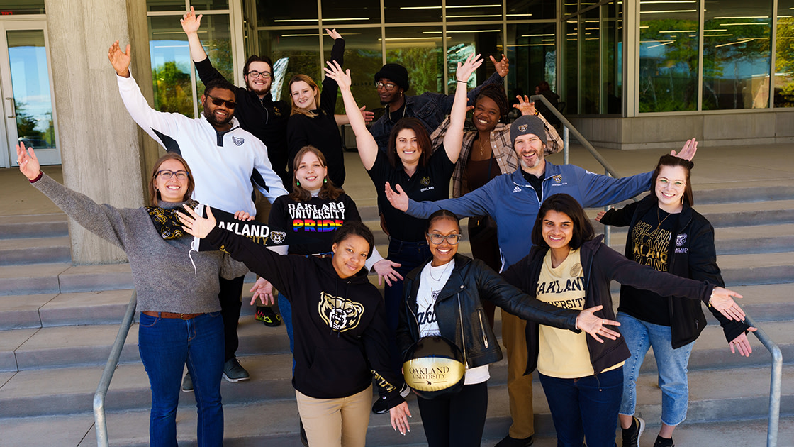 Students, faculty and staff gather on the steps of the Oakland Center to celebrate OU Day of Giving