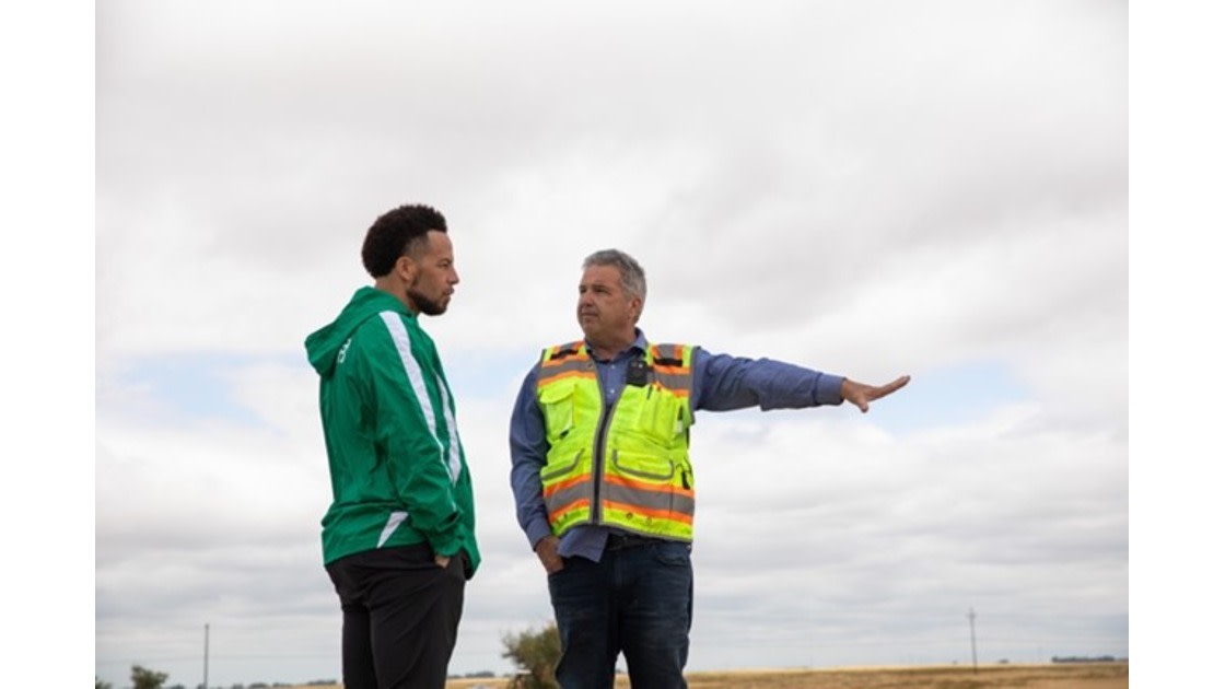 President Wood walking the future Placer Campus site