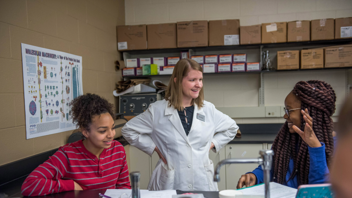 Female Faculty Member with Two Female Students