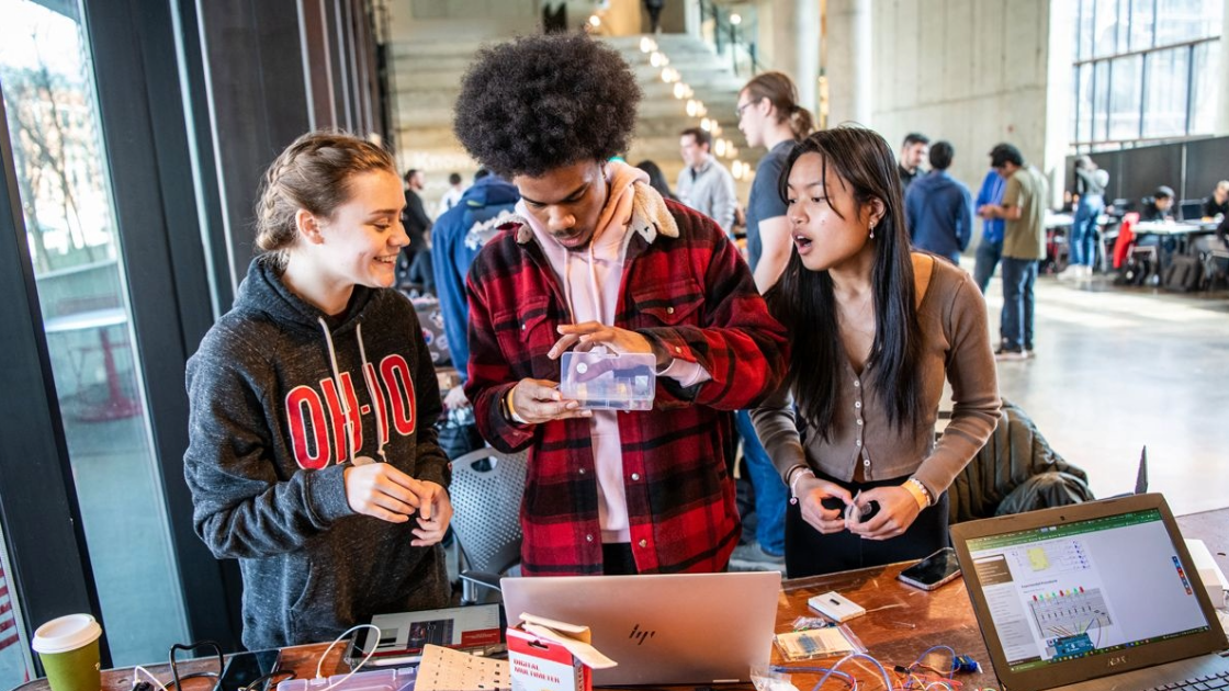 3 Students Working Together