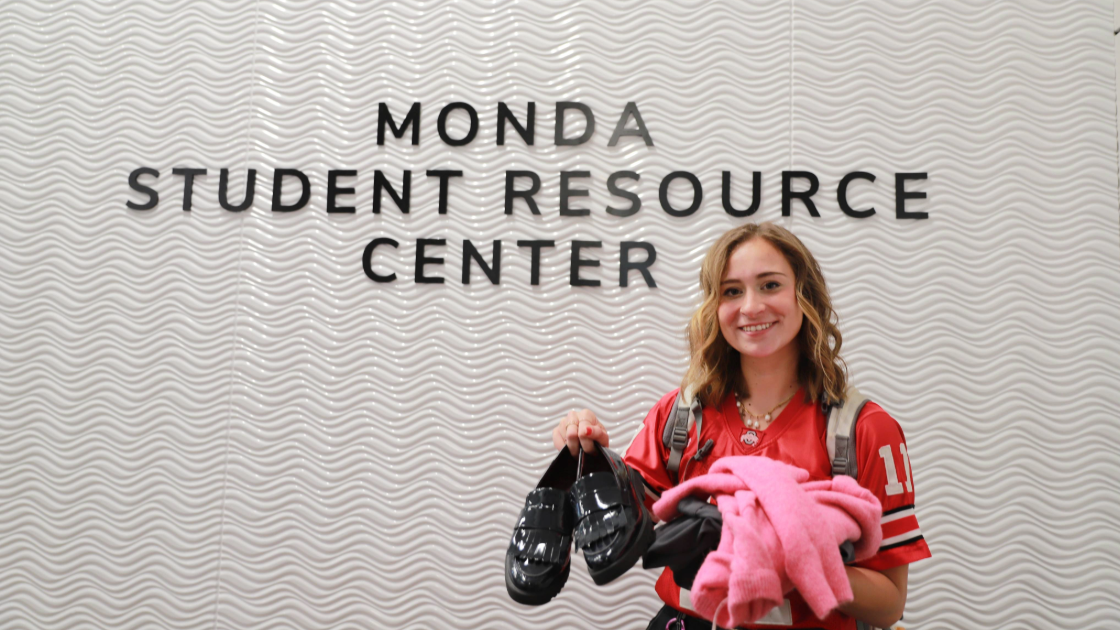 Student with Clothes Outside Monda Student Resource Center