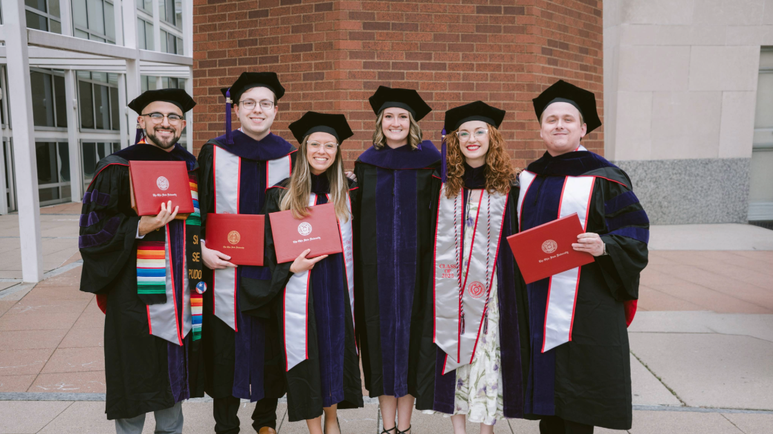 Law Students Holding Diplomas