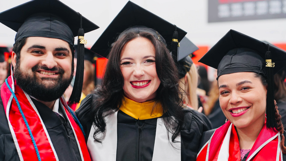 Three Students at Graduation