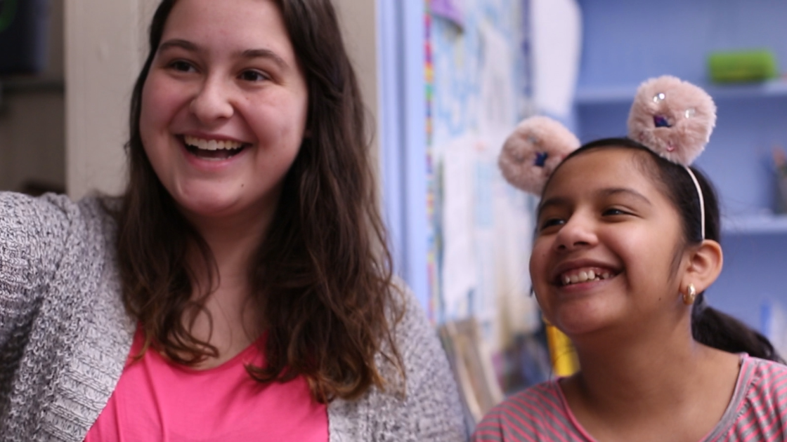 2 Females Taking Picture