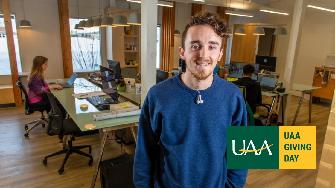 UAA Management student photographed at The BoardRoom in Anchorage