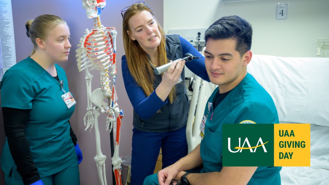 Nursing students learn exam procedures in the UAA Health Science Building simulation labs
