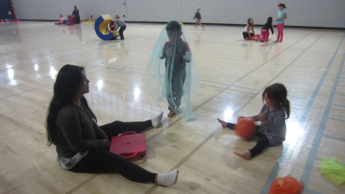 Child Development Center kids having fun while their parents can attend class and study