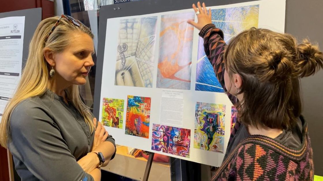 Butler Art student shares her work at the Undergraduate Research Convention with Provost Barnett