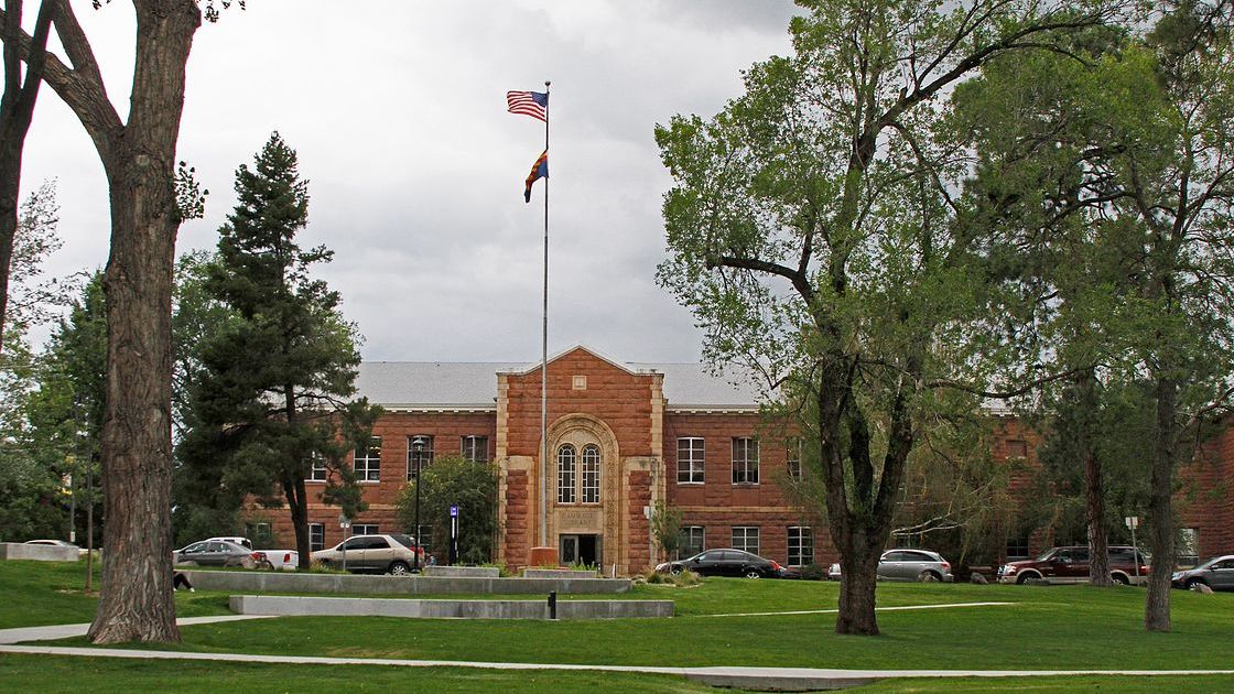 Student is being helped by adult mail