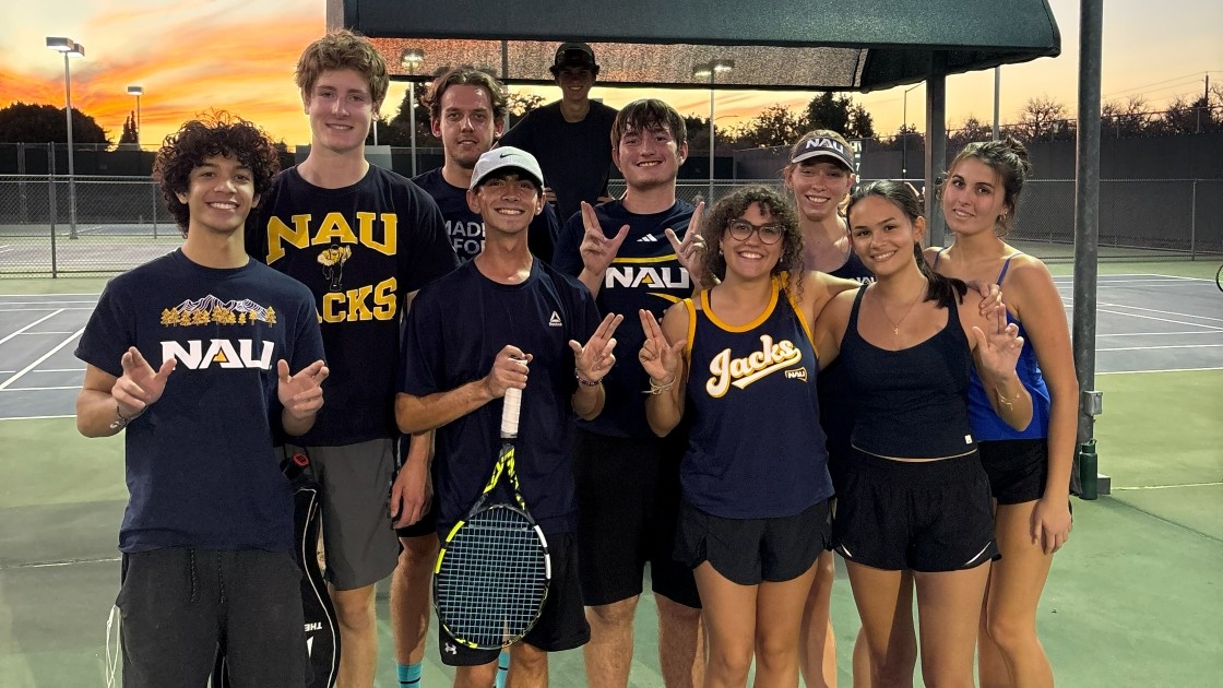 C team in Tuscon against a sunset.