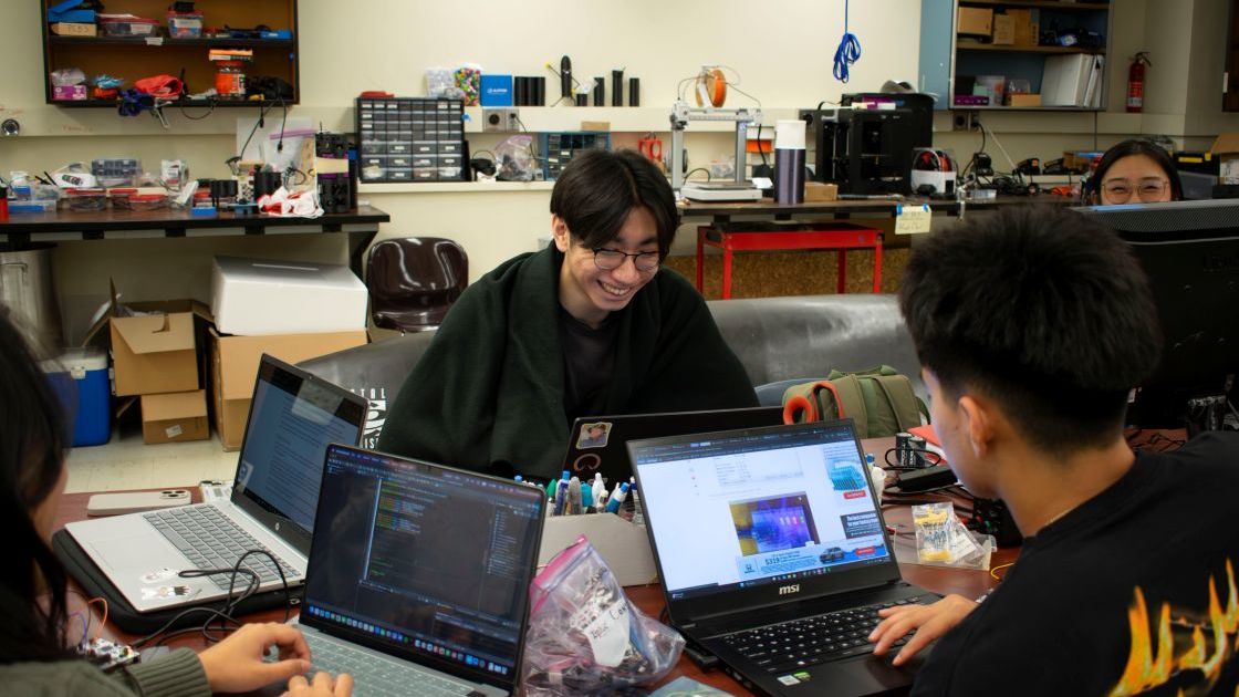 HyperXite 11 Controls Team collaborating in the lab