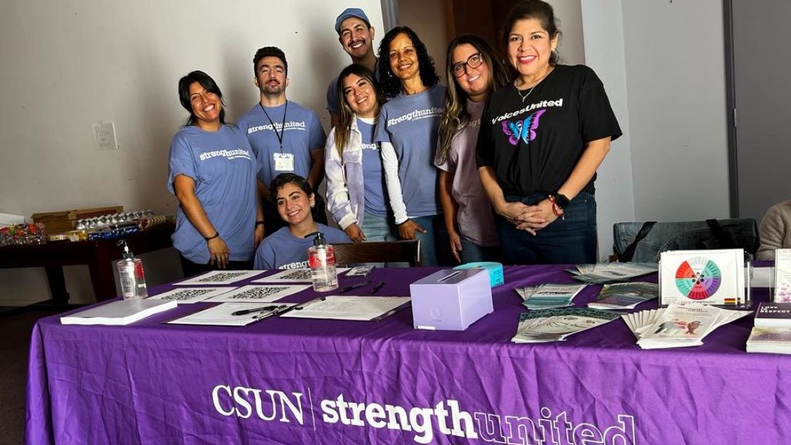 CSUN StrengthUnited team hosting an outreach booth to promote support services and awareness.