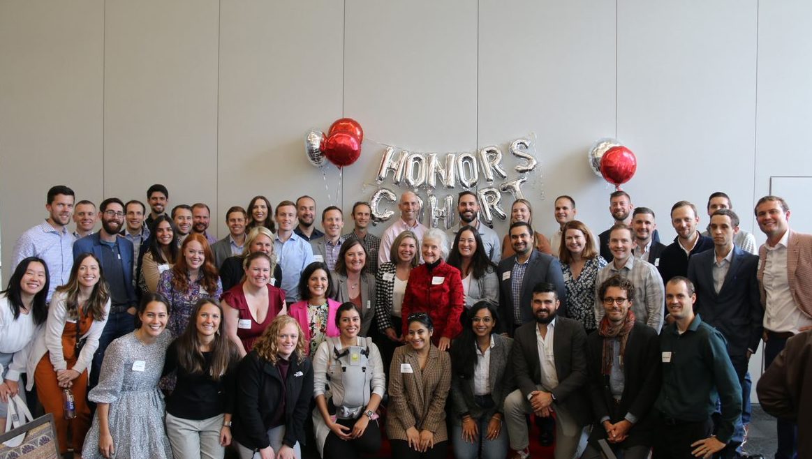A large group celebrating at the Nancy Award