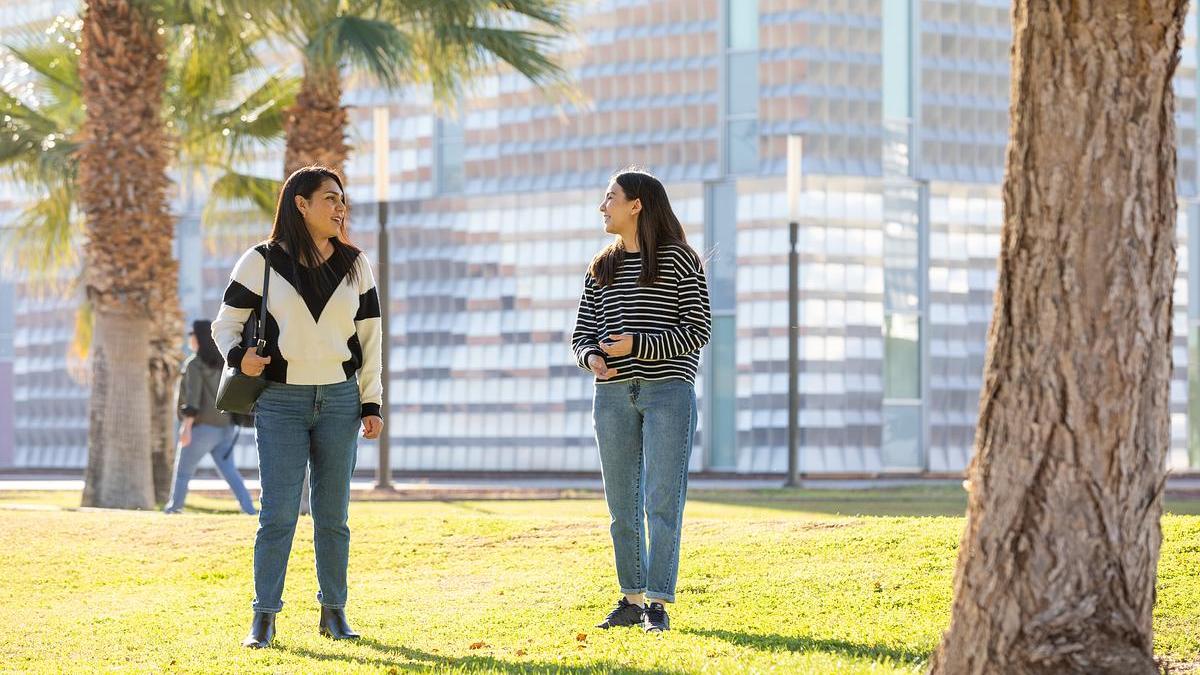 Two students talking on the quad at NAU Yuma campus