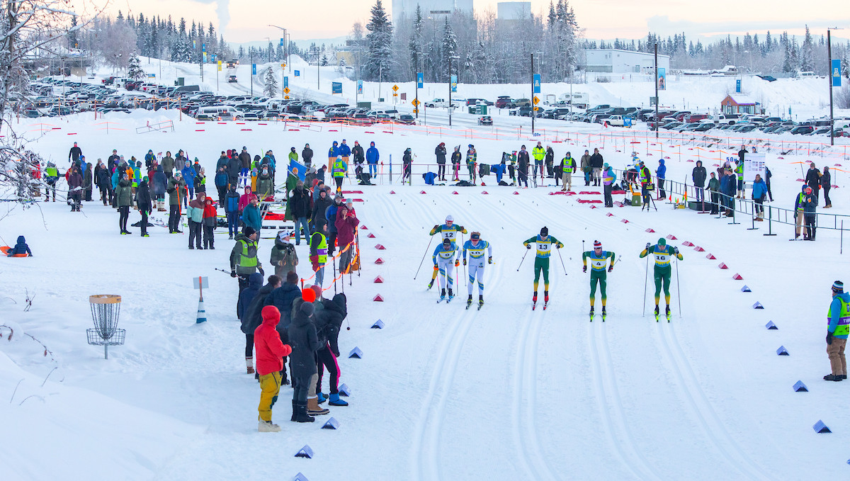 UAA and UAF skiers taking off from the start line at the 2025 UAF Invite.