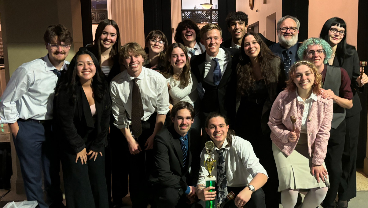 Two of our teams with our second ever team trophy at the regional competition in San Diego.