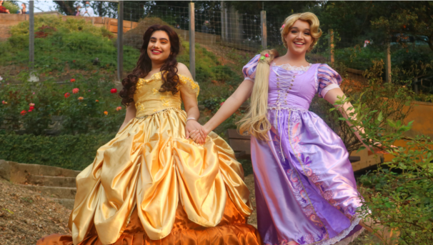 Rapunzel (president, Raeanna Kilby) and Belle (vice president, Mandeep Ladhar)