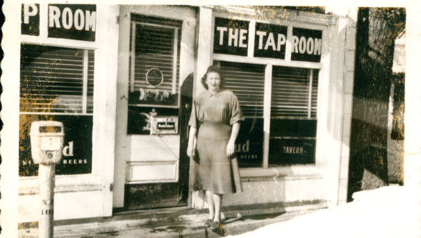 Maxine outside of the original storefront of the Tap Room