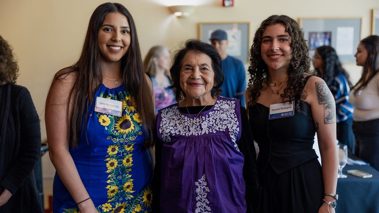 Legislative Fellows Lourdes Orenlas and Desiree Rodriguez with Senator John Laird