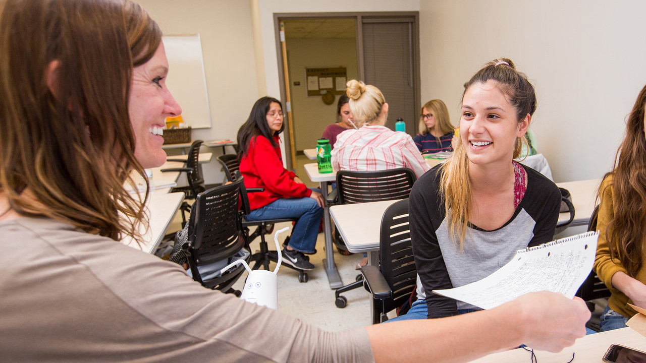 Social work class conversation with professor