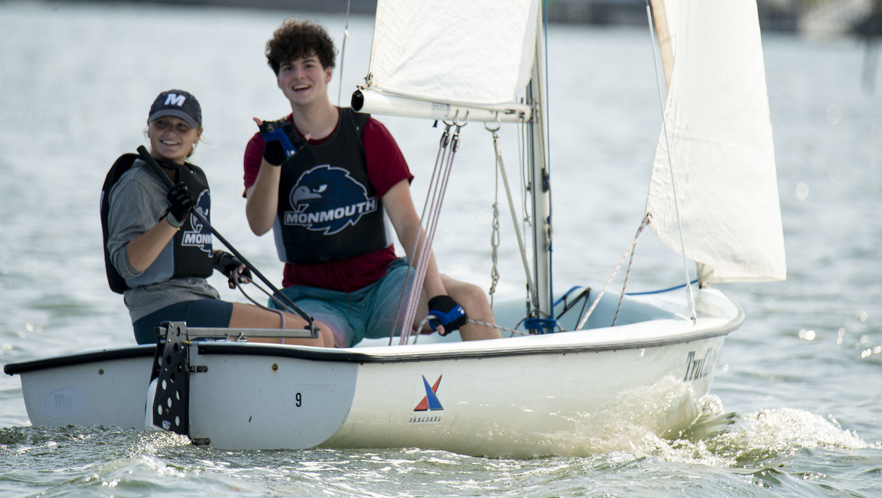 Two Sailing Club members aboard vessel