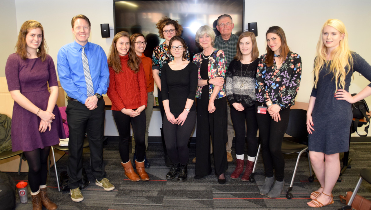 Ohio State faculty and staff standing together in a classroom.