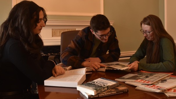 Cowboy Delegates reviewing materials