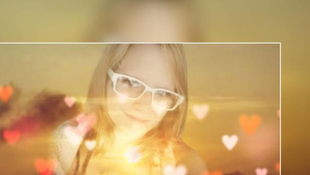 Tessa Marie Clagg against a heart and sunset background