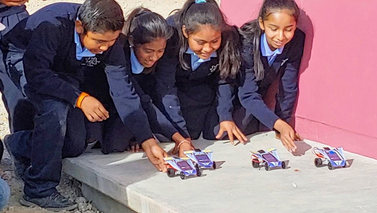 Children racing solar powered cars