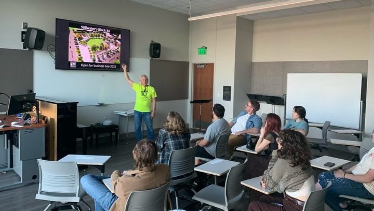 Jim Beckstrom speaks at an MIA meeting about his festival, Dancing Turtle.
