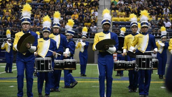 Drum section of Lumberjack Marching Band in stadium