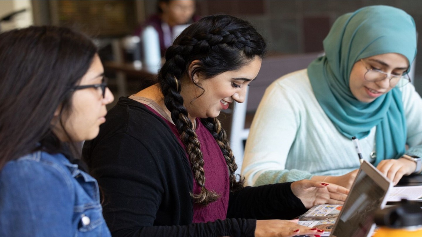 Three Students Studying