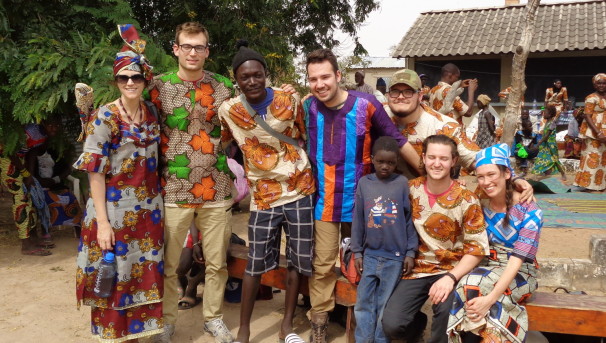 OSU students wearing Njau robes and shirts. They join natives in the town square