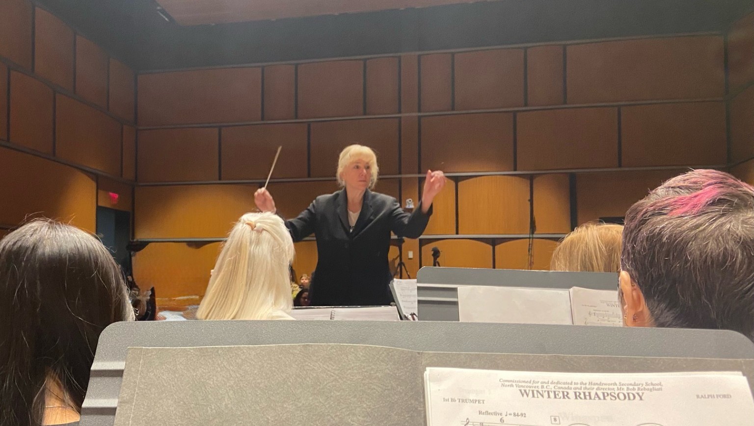 Cynthia Napierkowski leads The Community Band at Salem State in its Winter Concert December 2025