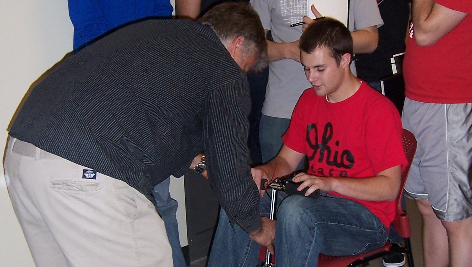 Joe West with students in the lab