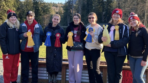 Equestrian Team members with ribbons