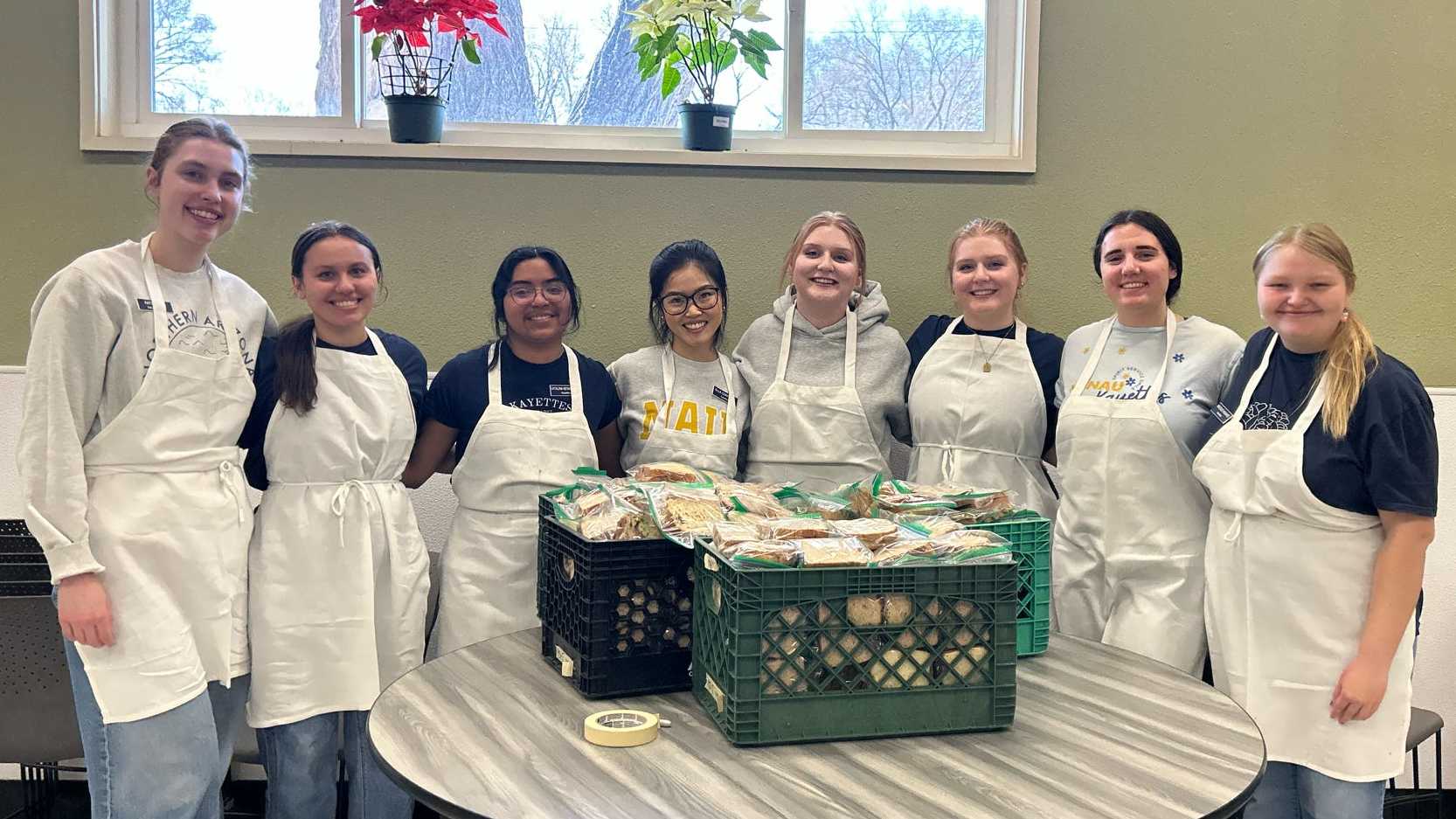 8 kayette members helping at Louies cupboard!